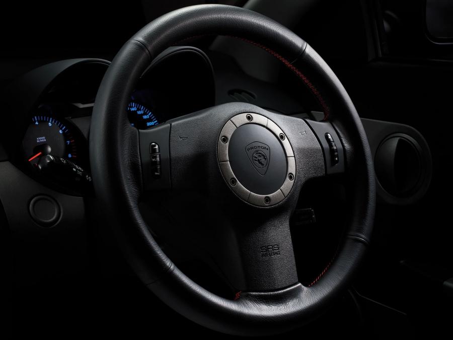 Детали интерьера Proton Satria Neo CPS 2009 года  (фото 4 из 14)